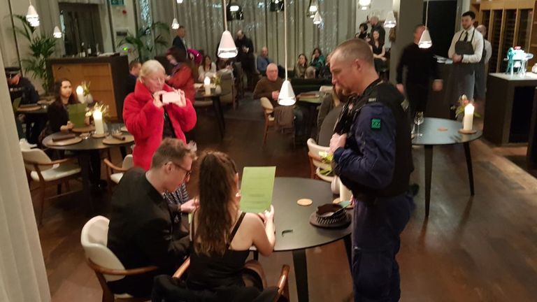 Police speaking to activists in Manchester&#39;s Michelin-star Mana restaurant