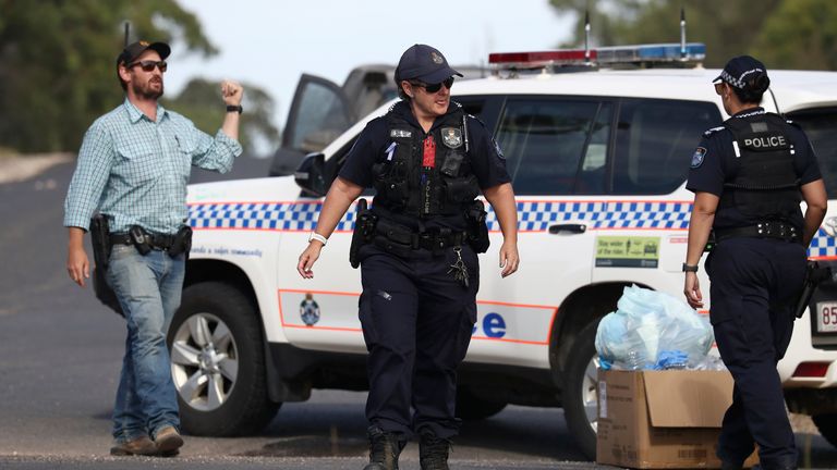 Police work near the scene of a fatal shooting in Wieambilla, Australia
Pic:AP