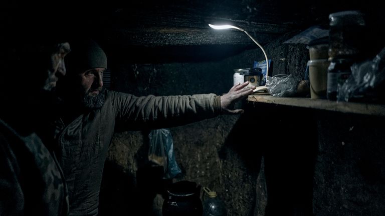 Ukrainian soldiers in a shelter in the frontline near Bakhmut, Donetsk region, Ukraine, Tuesday, Dec. 6, 2022. (AP Photo/LIBKOS)