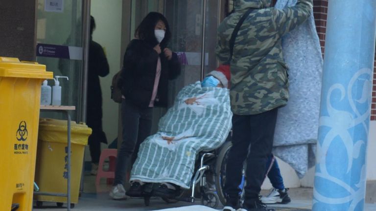 A patient is wheeled into Chaoyang Hospital, Beijing