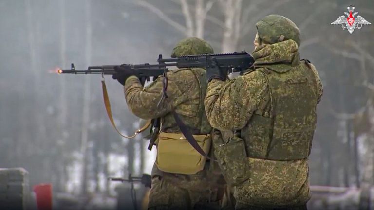 In this handout photo taken from video released by Russian Defense Ministry Press Service on Monday, Dec. 19, 2022, Russian troops take part in drills at an unspecified location in Belarus. Belarus provided its territory for the Russian troops that attacked Ukraine and maintained close defense ties with Russia. (Russian Defense Ministry Press Service via AP)