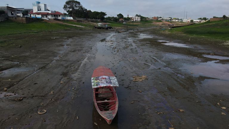 A boat is stranded by drought at Lagoa da Francesa, near the Amazonas River in Parintins, Brazil on October 21, 2022