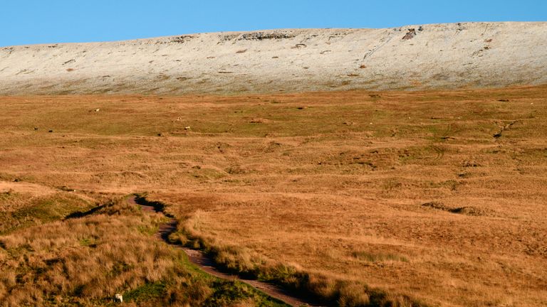 A light dusting of snow covers the tops of the Brecon Beacons. 7 December. Pic: AP
