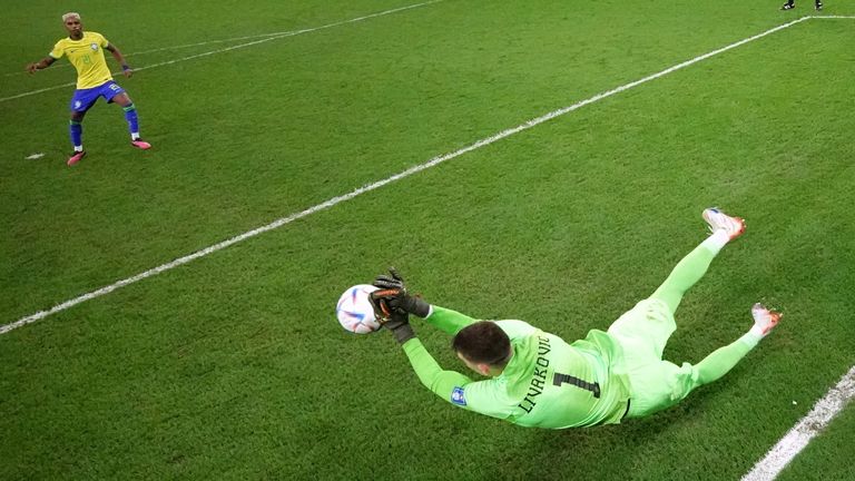 Croatia's Dominik Livakovic saves Rodrigo's penalty.