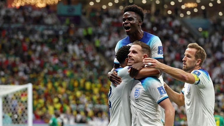 Soccer Football - FIFA World Cup Qatar 2022 - Round of 16 - England v Senegal - Al Bayt Stadium, Al Khor, Qatar - December 4, 2022 England&#39;s Jordan Henderson celebrates scoring their first goal with teammates REUTERS/Marko Djurica TPX IMAGES OF THE DAY