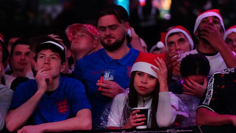 England fans take pictures in London during the quarter-final against France 