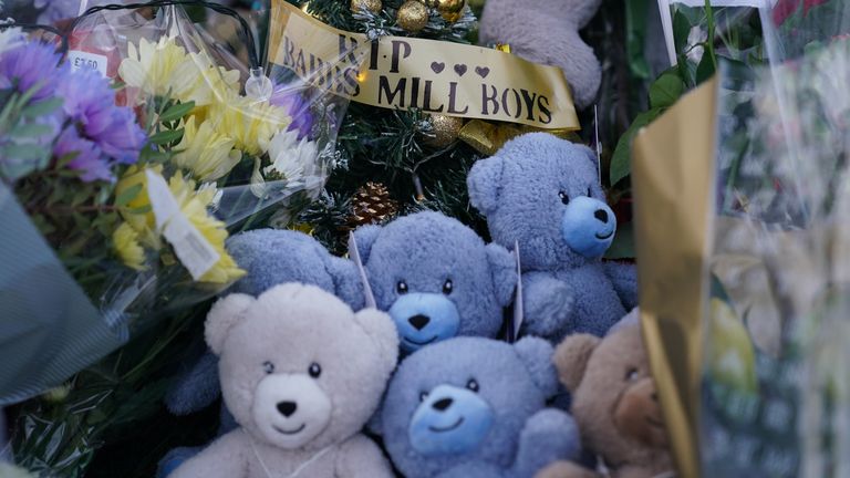 Flowers and tributes near to Babbs Mill Park in Kingshurst, Solihull, after the deaths of three boys aged eight, 10 and 11 who fell through ice into a lake in the West Midlands. Picture date: Tuesday December 13, 2022.
