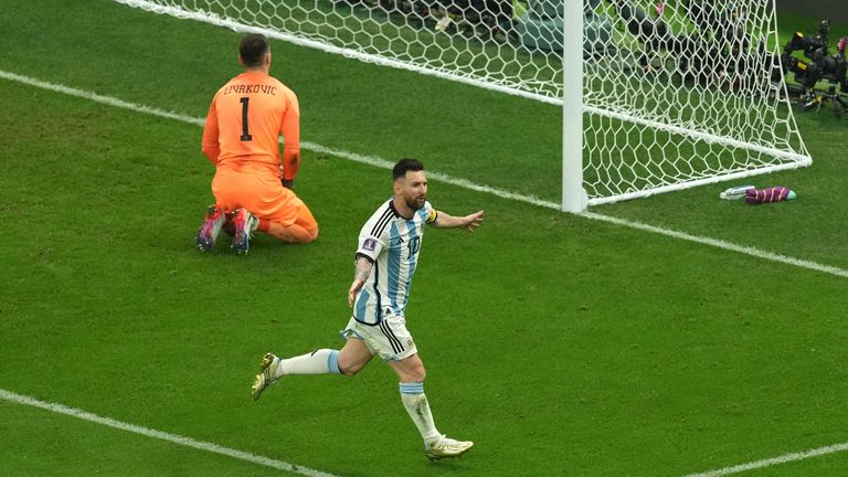 Lionel Messi celebrates scoring Argentina&#39;s first goal of the game