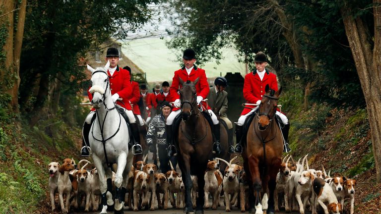 Members of the Old Surrey Burstow and West Kent Hunt ride to Chiddingstone Castle for the annual Boxing Day hunt in Chiddingstone, south east England December 26, 2014. 