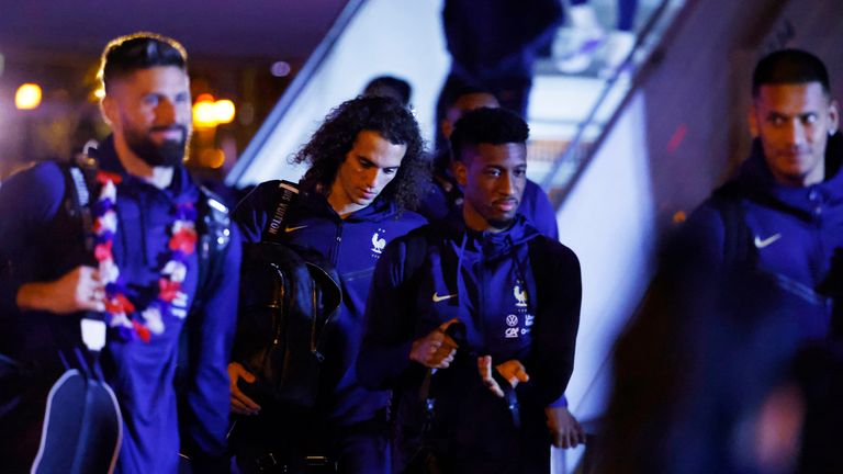 France's Matteo Guendouzi and teammates arrive at Paris Charles de Gaulle . airport