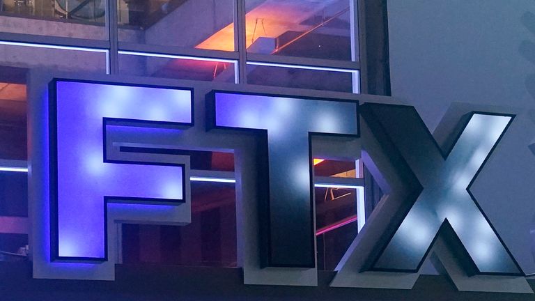 FILE - The FTX Arena logo appears where the Miami Heat will play on November 12th.  Miami, December 12, 2022. The former CEO of failed cryptocurrency exchange FTX said on Wednesday, November 22. 30. He didn't...knowingly" Misusing client funds and claiming he believed his millions of angry clients would eventually be whole.  (AP Photo/Marta Lavandier, File)