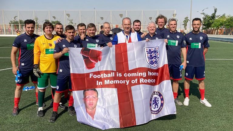 Undated handout photo issued by Garford Beck of England men&#39;s supporters&#39; team in Qatar with a flag made in memory of Reece Newcombe, 31, who died after he was stabbed on Richmond Bridge last month. Issue date: Monday December 5, 2022.

