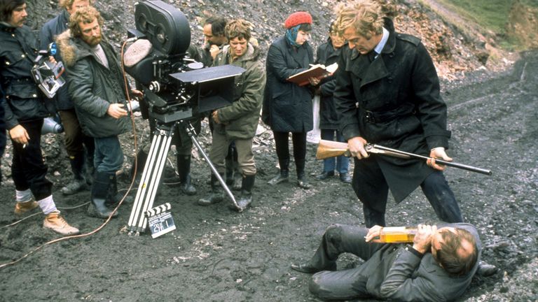 Michael Caine and Ian Hendry film a scene from Get Carter
