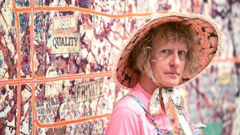 Grayson Perry with his piece titled Very Large Very Expensive Abstract Painting