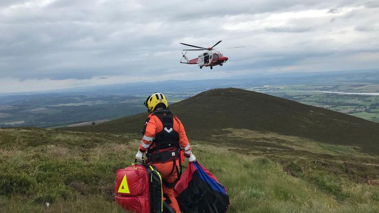 Handout photo issued by Moffat Mountain Rescue Team of a Search and Rescue helicopter, as the team were called at around 2pm on Wednesday to assist a walker near Dumfries with a suspected broken ankle.