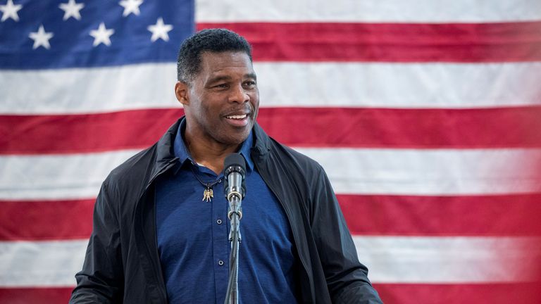 Republican U.S. Senate candidate Herschel Walker, who is facing Democratic Senator Raphael Warnock in a run-off election, speaks during a campaign stop in Ellijay, Georgia, U.S. December 5, 2022. REUTERS/Alyssa Pointer