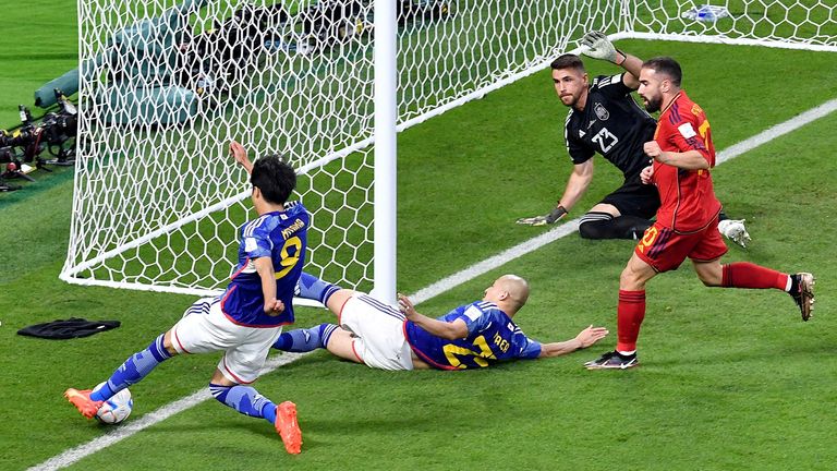 Soccer Football - FIFA World Cup Qatar 2022 - Group E - Japan v Spain - Khalifa International Stadium, Doha, Qatar - December 1, 2022 Japan's Kaoru Mitoma in action as the ball appears to cross the line before Japan's Ao Tanaka scores their second goal REUTERS/Jennifer Lorenzini TPX IMAGES OF THE DAY