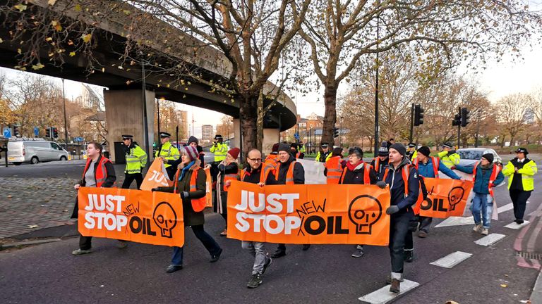  Just Stop Oil of protesters during a slow march blocking the Old Kent Road in south London.  