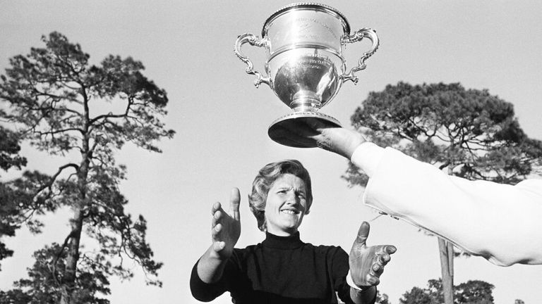 Kathy Whitworth of San Antonio, Tex., holds out her arms to winners cup as she leads the field of 36 going into the final round Sunday, Nov. 27, 1965 with a 54 hole total of 216 in Women&#39;s Titleholders Golf Tournament at Augusta, Ga. (AP Photo/Horace Cort)
Pic: AP