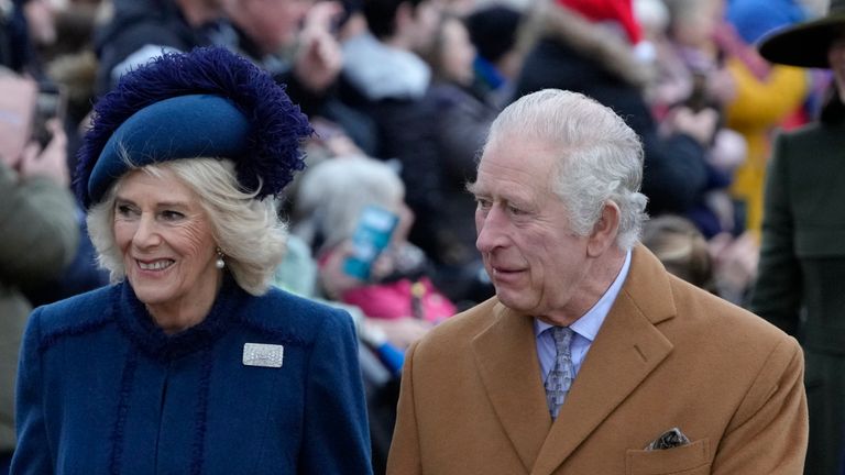 King Charles III, centre, and Camilla, the Queen Consort lead the Royal Family as they arrive to attend the Christmas day service at St Mary Magdalene Church in Sandringham in Norfolk, England, Sunday, Dec. 25, 2022. (AP Photo/Kirsty Wigglesworth)