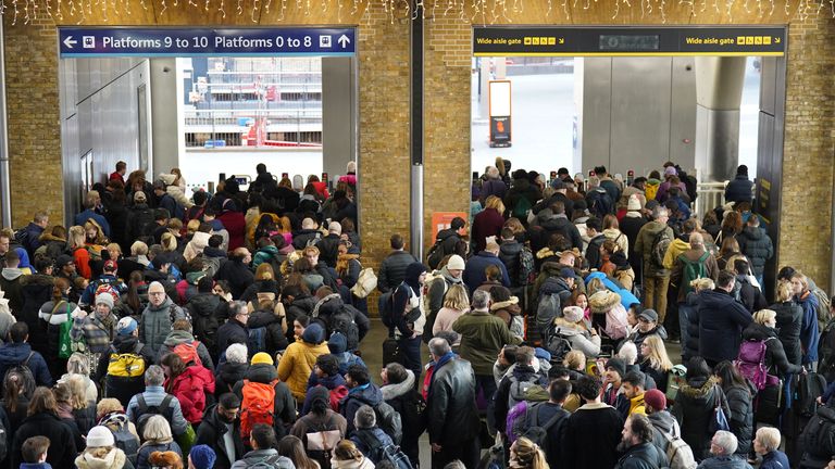 Passengers wait at the barriers at King&#39;s Cross station in London following a strike by members of the Rail, Maritime and Transport union (RMT), in a long-running dispute over jobs and pensions. Picture date: Tuesday December 27, 2022.

