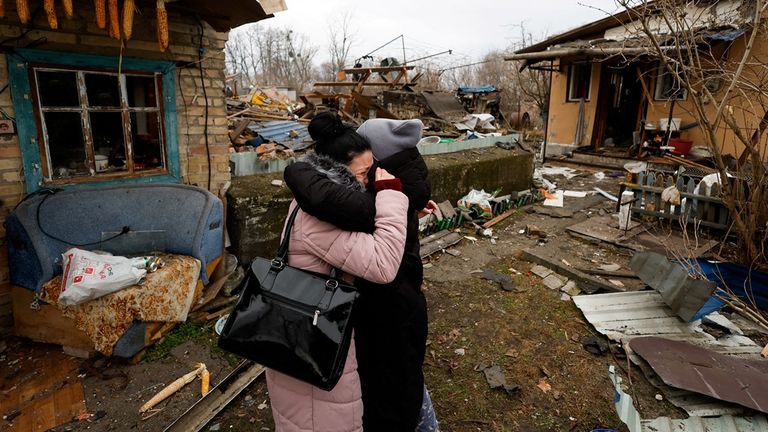 Friends are reunited after taking to underground bunkers to shelter from the shelling