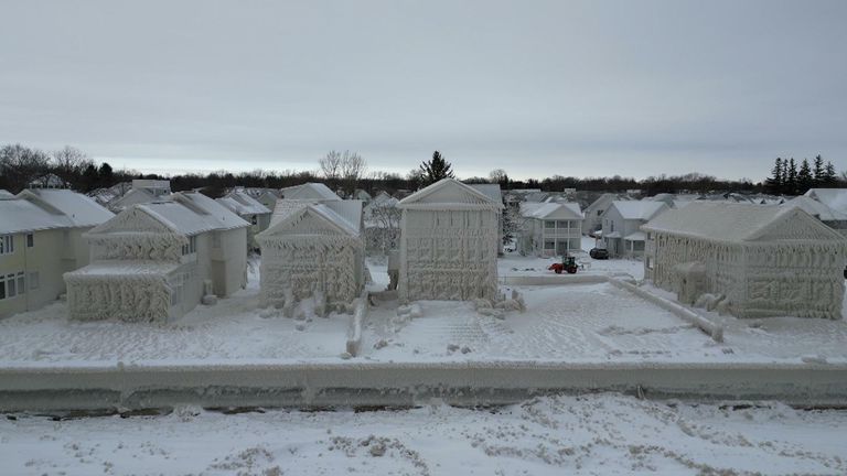 Homes on the shores of Lake Erie encased in ice.