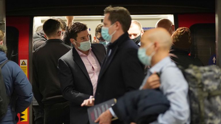 passengers wearing masks on the tube