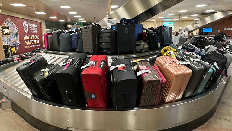 Luggage on the Southwest Airlines baggage carousel from delayed and canceled flights at Hollywood Burbank Airport, Monday, Dec. 26, 2022, in Burbank PIC:AP