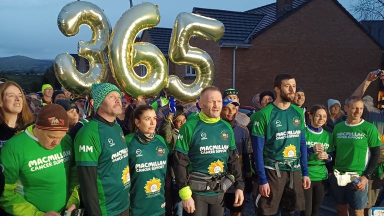 Gary McKee, 53, completed his 365th marathon of the year in Cleaton Moor, Cumbria, on New Year&#39;s Eve. Pic: Macmillan