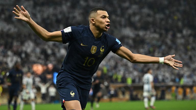 Soccer Football - Qatar 2022 FIFA World Cup - Final - Argentina v France - Lusail Stadium, Lusail, Qatar - December 18, 2022 Kylian Mbappe of France celebrates scoring the third goal to complete his hat-trick REUTERS/Dylan Martinez