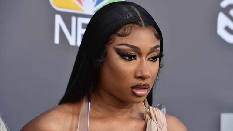 FILE - Megan Thee Stallion arrives at the Billboard Music Awards on May 15, 2022, at the MGM Grand Garden Arena in Las Vegas. Megan took the stand Tuesday, Dec. 13  in a Los Angeles courtroom in the trial of Tory Lanez, accusing the Canadian rapper of firing multiple gunshots at her feet as she tried to walk away from him in the Hollywood Hills more than two years ago. (Photo by Jordan Strauss/Invision/AP, File)