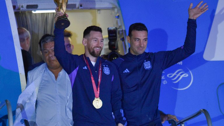 Argentina's Lionel Messi lifts the FIFA World Cup trophy.  Photo: AP 