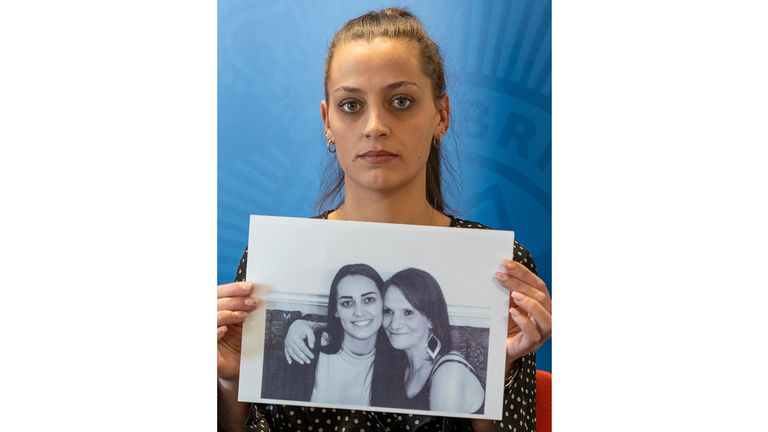Undated handout photo issued by Northumbria Police of Shannon Brown holding a photograph of herself with her mother (right) Michelle Hanson. Police are hunting Alexander Carr in connection with the murder of Michelle Hanson, whose body was found at a property in Brady Street, Sunderland, on December 2.Issue date: Thursday December 15, 2022.