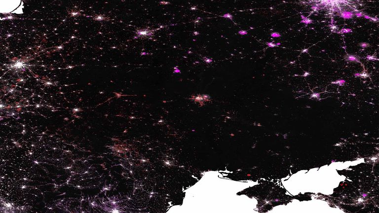 Change in light levels since the war broke out in Ukraine based on NASA Black Marble data. In red are areas emitting less light, in pink are areas emitting more.
