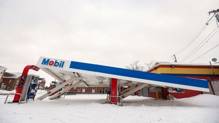 A collapsed gas station is seen following a winter storm in Buffalo, New York, U.S., December 27, 2022.  REUTERS/Lindsay DeDario