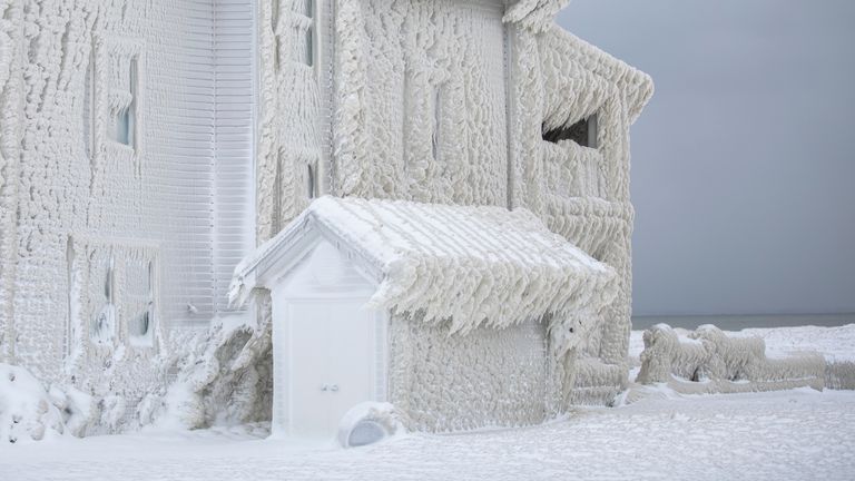 Homes along Lake Erie near Fort Erie, Ont., remain covered in ice on Tuesday, Dec. 12.  On February 27, 2022, after a winter storm swept through much of Ontario.Image: Associated Press
