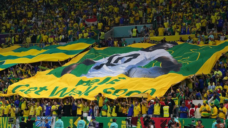 Brazil fans hold a banner saying Pele Get Well Soon during the FIFA World Cup Group G match at the Lusail Stadium in Lusail, Qatar. Picture date: Friday December 2, 2022.
