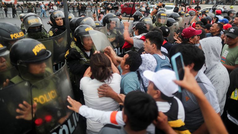 Clashes between protesters and police in the capital Lima