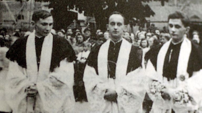 Pope Benedict XVI is pictured with fellow priests, his brother Georg Ratzinger and his friend Rupert Berger, on the day they were ordained priests in Munich June 29, 1951 file photo. 