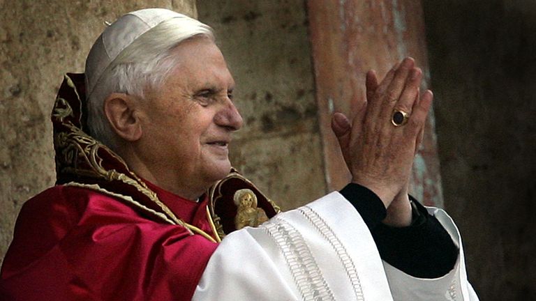 The new elected Pope Benedict XVI blesses pilgrims from a balcony of St. Peter&#39;s Basilica at the Vatican. 