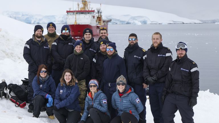 Undated handout photo issued by Ministry of Defence of HMS Protector&#39;s Ship&#39;s Company and UKAHT team work together in Port Lockroy, Antarctica. Royal Navy sailors came to the aid of four women who have taken up jobs at the isolated Antarctic scientific base after heavy snowfall buried some of the buildings. Issue date: Saturday December 3, 2022.