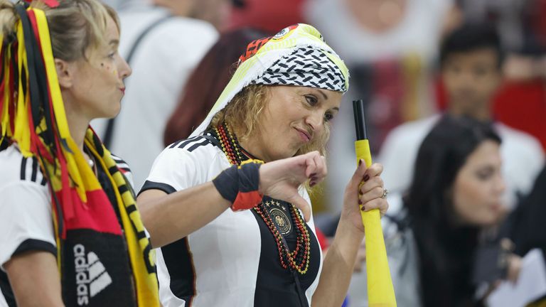 Disappointed Germany fans as their side crash out of the World Cup in Qatar