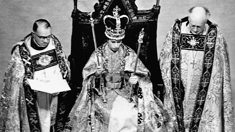 Embargoed to 2200 Saturday December 3, 2022 GMT File photo dated 02/06/53 of Queen Elizabeth II wearing the St. Edward Crown and carrying the Sceptre and the Rod after her coronation in Westminster Abbey, London. The iconic St Edward&#39;s Crown has been removed from the Tower of London to be resized for the King ahead of the Coronation. Issue date: Saturday December 3, 2022.