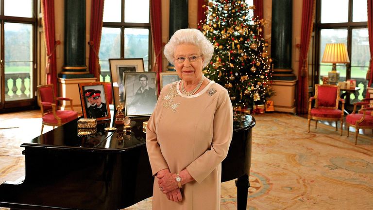 The late Queen stands in the Music Room of Buckingham Palace after recording her Christmas Day message. Pic: AP