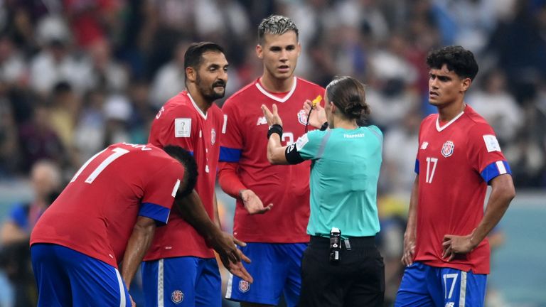 Soccer Football - FIFA World Cup Qatar 2022 - Group E - Costa Rica v Germany - Al Bayt Stadium, Al Khor, Qatar - December 1, 2022 Costa Rica&#39;s Celso Borges, Juan Pablo Vargas and Yeltsin Tejeda remonstrate with referee Stephanie Frappart REUTERS/Annegret Hilse