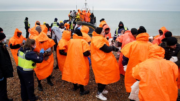 A group of people thought to be migrants are brought in to Dungeness, Kent, after being rescued by the RNLI following a small boat incident in the Channel. Picture date: Friday December 9, 2022.

