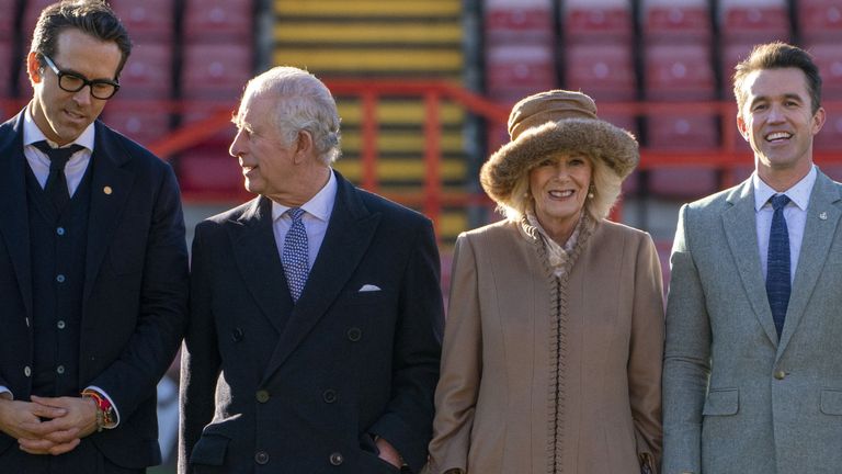 King Charles and Camilla were greeted by Hollywood royalty during a visit to Wrexham AFC 