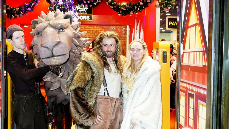 Chris Jared (centre) and Samantha Womack during the unveiling of Hamleys Christmas windows in Regent Street, London. 