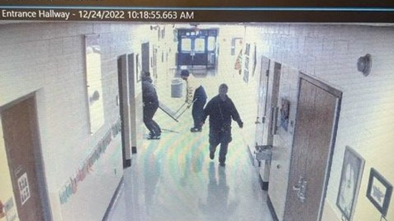 CCTV from school where Jay Withey broke into in Buffalo, New York school, to help people who were stranded in the US bomb cyclone. Pic: via Storyful